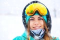 Happy young snowboarder girl in snowboard goggles. Royalty Free Stock Photo