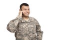 Smiling soldier talking on cell phone Royalty Free Stock Photo