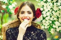 Happy young spanish girl in green spring garden Royalty Free Stock Photo