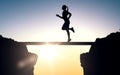 Happy young sports woman running outdoors