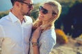 Happy young stylish couple in love at nature at summer Royalty Free Stock Photo