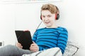 Happy young teenage boy relaxing with his music Royalty Free Stock Photo