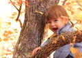 Happy Young Toddler Girl in Autumn Playing