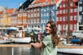 Happy young tourist woman smiling at camera Royalty Free Stock Photo