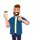 Happy young trendy man holding a coffee cup and showing, gesturing thumbs up sign. Male character design illustration. Royalty Free Stock Photo