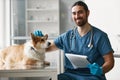 Happy young vet clinician with stethoscope on neck looking at camera