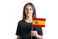 Happy young white girl holding Spain flag isolated on a white background