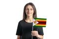 Happy young white girl holding Zimbabwe flag isolated on a white background Royalty Free Stock Photo