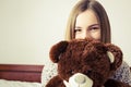Teen girl with a teddy bear Royalty Free Stock Photo