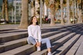 Happy young woman breathing deep fresh air