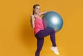 Happy Young Woman Celebrating Sport Success With Fitness Ball Royalty Free Stock Photo