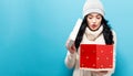 Happy young woman with Christmas present box Royalty Free Stock Photo