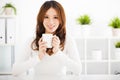 Happy young woman drinking coffee Royalty Free Stock Photo