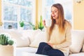 Happy young woman drinking coffee Royalty Free Stock Photo