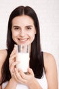 Happy young woman drinking milk Royalty Free Stock Photo