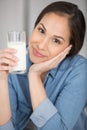 happy young woman drinking milk Royalty Free Stock Photo