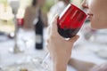 Happy Young Woman Drinking Red Wine At Party Royalty Free Stock Photo