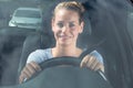 Happy young woman driving car Royalty Free Stock Photo