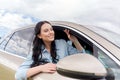 Happy young woman driving in car Royalty Free Stock Photo