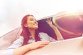 Happy young woman driving in car Royalty Free Stock Photo