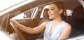 Happy young woman driving car on sunny day. Banner design Royalty Free Stock Photo