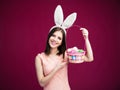 Happy Young Woman With An Easter Egg Basket