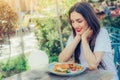 Happy young woman eat tasty fast food burger Royalty Free Stock Photo