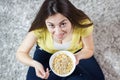 Happy Young Woman Eating Cereal Breakfast Royalty Free Stock Photo