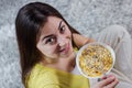 Happy Young Woman Eating Cereal Breakfast Royalty Free Stock Photo