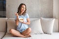 Happy young woman eating healthy breakfast Royalty Free Stock Photo