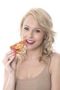 Happy Young Woman Eating Pizza Slice Royalty Free Stock Photo