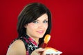 Happy young woman eating sushi Royalty Free Stock Photo