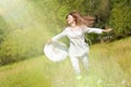 Happy Young Woman Enjoying Summer on the Green Meadow. Royalty Free Stock Photo