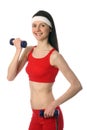 Happy young woman exercising with dumbbells Royalty Free Stock Photo