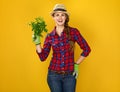 Happy young woman farmer showing fresh parsley Royalty Free Stock Photo