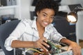 Happy young woman fixing pc computer Royalty Free Stock Photo