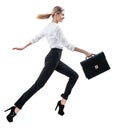 Happy young woman in formal wear jumping . Royalty Free Stock Photo