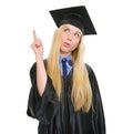 Happy young woman in graduation gown got idea Royalty Free Stock Photo