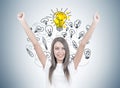 Happy young woman with hands in the air, idea Royalty Free Stock Photo