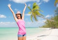 Happy young woman in hat on summer beach Royalty Free Stock Photo