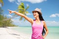 Happy young woman in hat on summer beach Royalty Free Stock Photo