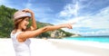 Happy young woman in hat on summer beach Royalty Free Stock Photo