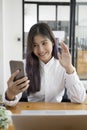 Young woman having video call on her smart phone. Royalty Free Stock Photo