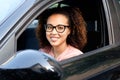 Happy young woman in her new car Royalty Free Stock Photo