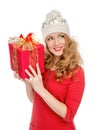 Happy young woman hold red Christmas wrapped gift present smiling surprised Royalty Free Stock Photo