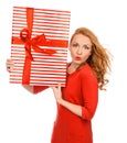 Happy young woman hold red Christmas wrapped gift present smiling surprised Royalty Free Stock Photo