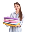 Happy young woman holding clean towels on white background Royalty Free Stock Photo