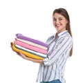 Happy young woman holding clean towels on whitey Royalty Free Stock Photo