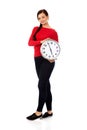 Happy young woman holding clock Royalty Free Stock Photo