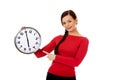 Happy young woman holding clock Royalty Free Stock Photo